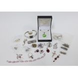 Collection of silver jewellery to include a necklace, earrings, pendants and rings, etc (a lot)