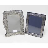 Silver framed mirror, Sheffield 1989, 27 x 20 & a silver photograph frame, London 1986, (2)