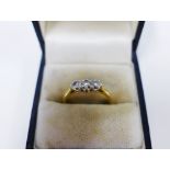 18ct gold three stone diamond ring, London 1998, UK size O