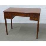 Mahogany writing desk / table, the rectangular top with moulded edge over an arrangement of five