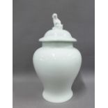 Early 20th century Limoges celadon lidded jar, the cover with a temple lion finial, 27cm