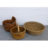 Burrwood bowl and two Vietnamese style baskets, one circular the other oval with a hooped handle, (