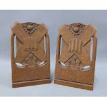 A pair of oak Edinburgh crested bookends, Rogers, High St , Oxford mark to base, (2) 17cm high