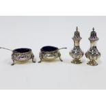 Victorian silver condiment set, London 1879, comprising a pair of circular salts with blue glass
