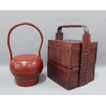 South East Asian food basket of square form with two layers and chinoiserie handle, 38cm high