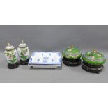 A pair of cloisonne lidded jars and vases and two blue and white chijoiserie ashtrays, (6)
