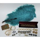 Collection of costume jewellery, vintage Rigu compact, buttons, buckle and blue ostrich feather fan,