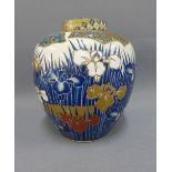 Japanese jar and cover, likely Meiji period, in iris pattern, complete with inner cover, blue mons