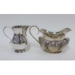 Walker & Hall silver cream jug, Birmingham 1964 and another with embossed floral pattern, Birmingham