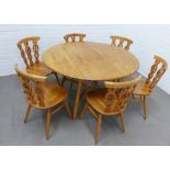 Ercol set of six fleur de lys chairs together with a drop leaf table 124 x 112cm (7)