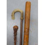 Shepherds style crook with horn horn handle, gnarled wood walking cane and a carved wooden club,