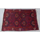 Persian rug, North West Iran, red field, flowerhead medallions, 277 x 135cm