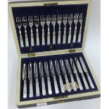 Set of twelve mother of pearl and silver plated fruit knives and forks, in a leather fitted case