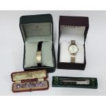 Lady's Accurist wrist watch and a Gucci wrist watch, both boxed, together with a set of six