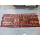 Persian runner, red and blue field with birds and other motifs, 310 x 120cm