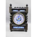 Ebonised mantle clock with blue and white pottery dial with brass A&N movement 20 x 31cm