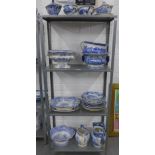 A large collection of Staffordshire blue and white transfer printed pottery to include sauce