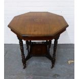 Edwardian rosewood and inlaid table with octagonal top, raised on turned legs with ceramic