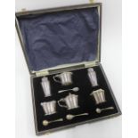 George VI silver six piece condiment set, Birmingham 1949, in fitted case, complete with spoons (6)