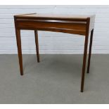 Mid Century teak side table, rectangular top with rounded edges, single long drawer and stylised