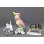 Royal Copenhagen figure group of two does, Rosenthal porcelain figure group of three fledglings on a