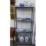 A large collection of Staffordshire blue and white transfer printed pottery to include jugs, serving