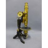 Swift & Sons petrological microscope, in black and brass, 36cm tall