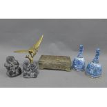 Mixed lot to include a brass bird, inuit style carvings, two pottery bells and a Japanese metal box,