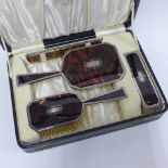 George VI silver mounted brush set comprising hairbrush, clothes brush, hand mirror and comb, in