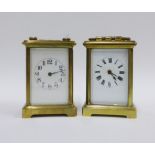 Two brass cased carriage clocks, 14cm including handle (2)