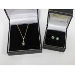9ct gold diamond and emerald flowerhead pendant on a 9ct gold chain necklace together with a pair of