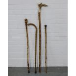 Four walking sticks, longest 124cm (4)