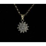 9ct gold diamond cluster pendant on a 9ct gold box link chain