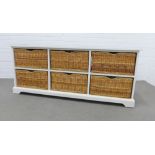 Modern white laminated six drawer wicker basket storage unit. 62 x 148 x 38