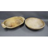 An oval wooden tub and another of circular form, largest 56cm (2)