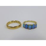 18ct gold wedding band and a 9ct gold opal dress ring, both size O (2)
