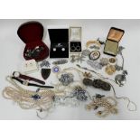 Collection of costume jewellery to include brooches, earrings, necklaces and wristwatches, etc (a
