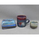 Margery Clinton (1931-2005) pottery to include a mug, box with cover and a small bowl, 12 x 8cm (3)