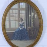 Full length photographic portrait print of a lady, framed under glass within an ornate oval gilt