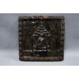 Eastern treacle glazed tile plaque, 24 x 23cm