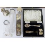 Cased silver set with pusher, spoon and napkin ring, glass vase with silver rim and two dressing