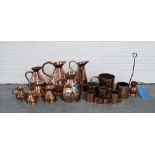 Collection of 19th century and later copper wares to include harvest jugs, gill measures, cider