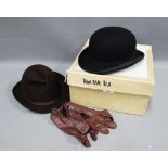 Herbert Johnson brown felt hat, Scott & Co black bowler hat and a pair of brown leather gloves (3)