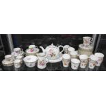 Quantity of Dresden porcelain tea wares to include a teapot, cups of various size and saucers, side
