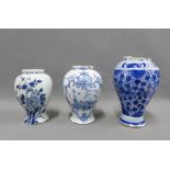 Three antique Delft blue and white jars (all with losses) (3)