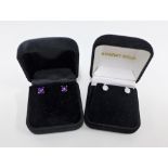 Pair of amethyst stud earrings and a pair of white metal and diamond stud earrings (2)