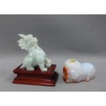 Jade temple lion dog and a carved jade dog, 7cm (2)