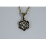 9ct gold flowerhead pendant set with diamonds, on a 9ct gold chain necklace