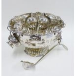 Silver plate Monteith punch bowl with an Epns ladle and set of nine cups, plus two lacking handles ,