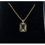 Art Deco style 9ct gold sapphire and diamond pendant on a 9ct gold chain